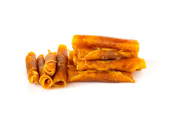 homemade dried sweet mango paste made from ripe mangoes mixed with sugar and salt isolated on white background , traditional  preserved fruit
