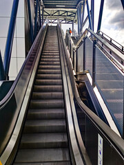 Architecture construction of elevator, escalator stairs and sky walk way, walk bridge between sky train station and department store mall