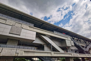 Architecture construction of elevator, escalator stairs and sky walk way, walk bridge between sky train station and department store mall