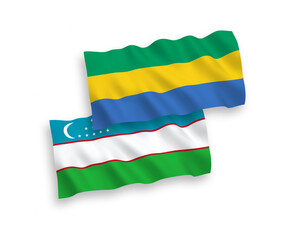 Flags of Gabon and Uzbekistan on a white background