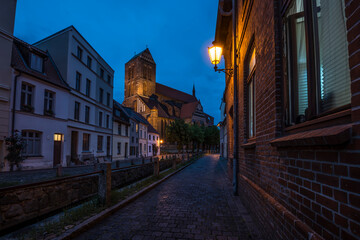 Litte street in Wismar at night.