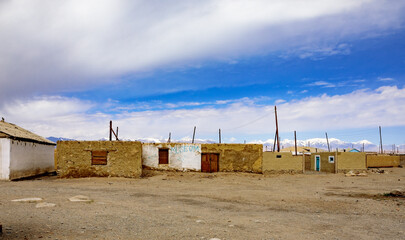Fototapeta na wymiar Post apocalypse settlement - Karakol. Lake, mountains and desert!