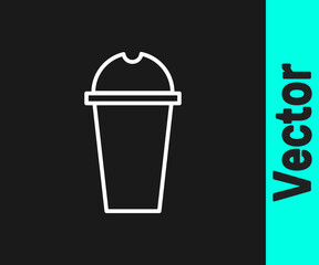 White line Milkshake icon isolated on black background. Plastic cup with lid and straw. Vector Illustration.
