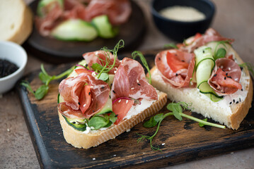 bacon sandwich with vegetables and cream cheese