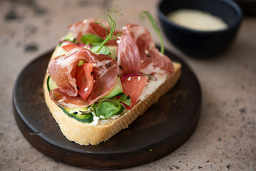 bacon sandwich with vegetables and cream cheese