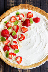 Strawberry cake with mascarpone cheese, almonds and mint. Tart. Cheesecake. Pie. Vegetarian food. Recipe.