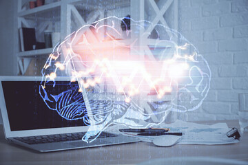 Multi exposure of work table with computer and brain hologram. Brainstorm concept.