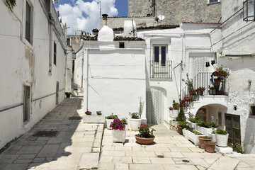 A narrow street in the old town of Monte Sant'Angelo in the Puglia region, Italy.
