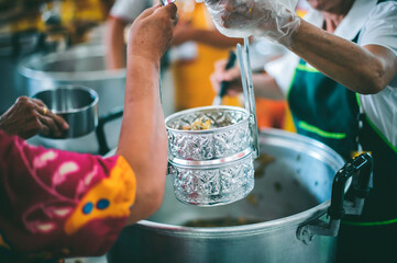 Obraz premium Donate Meals for Poor Persons in Thailand