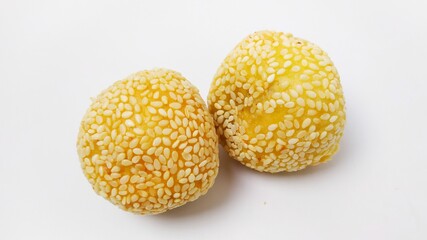 Indonesian tradisional food onde onde or sesame ball with mung bean filling isolated on white background