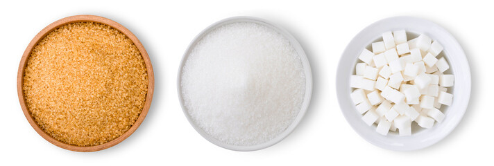 Three various types of sugar(brown granulated, white sand and sugar cubes ) in bowl isolated on white background. Top view.Flat lay.  