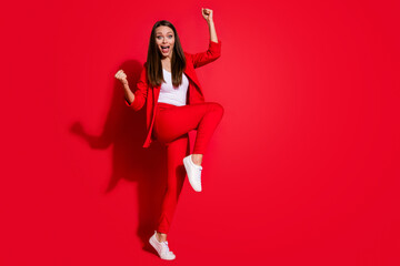 Full body photo of crazy business lady manager raise leg fists up ecstatic unbelievable achievement...