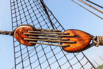 sailing ship wooden block and tackle with hemp rope