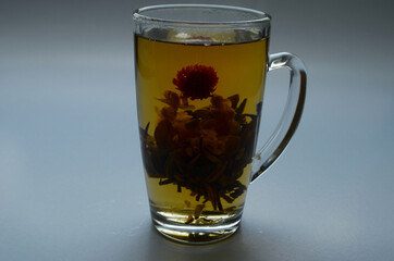 Tea cup with tea leaves.
