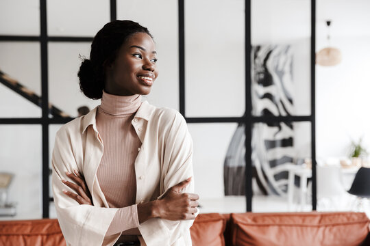 Happy cheerful optimistic young african woman