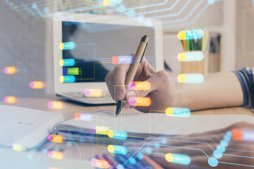 Double exposure of woman's hands on background with technology and digital coding icons. Data development concept. Close up.