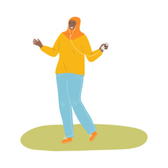 Young muslim woman in hijab and sport clothing listening to music