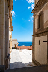 Positano, Italy. May 27th, 2020. Church of Santa Maria Assunta in Positano. Glimpse of the church square and the bell tower.