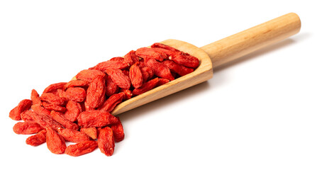 dried Chinese wolfberries in the wooden scoop, isolated on white background