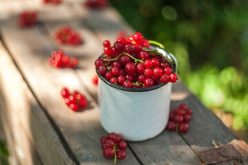 red currants on a wooden table