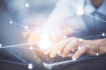 Media network theme hologram with man working on computer on background. Concept of internet communication. Double exposure.