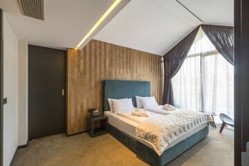 Interior of a luxury hotel bedroom in mountain hotel resort
