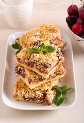 Cherry and coconut bars, served