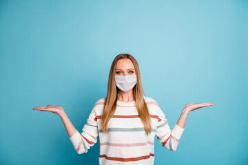 Portrait of her she nice girl wearing safety mask holding on palm choose choice copy space mers cov...