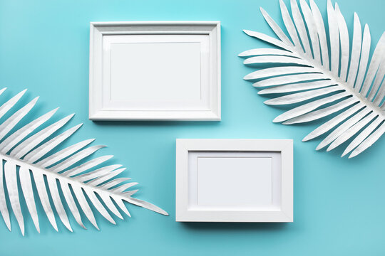 Picture frame with white tropical leaf.background design decoration