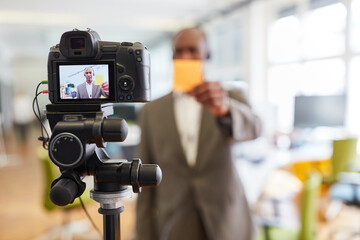 Business man recording video for a tutorial