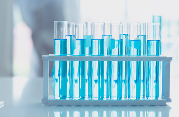 Scientist covid-19 virus chemistry  research experiment biotech antibody sample laboratory cultivate vaccine against virus. Scientist look at microscope, science test tube analyse Chemistry laboratory