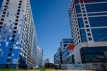 Beautiful new modern residential area by the sea. Sunny panorama of housing class comfort. Modern architecture. Residential Cosplay I - Romantic, St. Petersburg, Russia, 06.24.2020