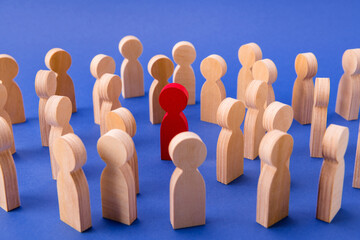 Crowd of wooden figures people walking strolling in big city. One special guy talented businessman...