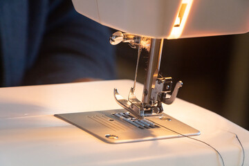 Close up on a sewing machine foot
