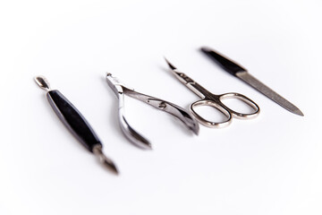 Tools of a manicure set on a white background