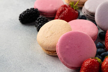 Stack of colored macaroon cookies close up