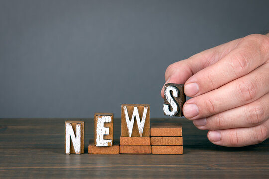 NEWS. Social Media, Announcement, Report and Survey concept. Wooden alphabet letters on steps - Powered by Adobe