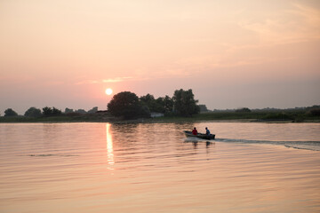 Fototapeta na wymiar Breathtaking sunset in Danube Delta, Romania, in a summer day; outdoors