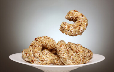 Biscuits with nuts on plate.Studio shot.No people