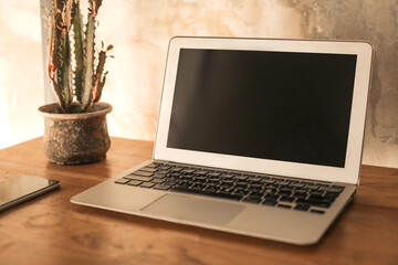 Fototapeta premium Laptop on a modern office desk