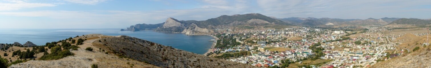Fototapeta na wymiar Scenic panorama of Sudak town bay in Crimea, Russia.