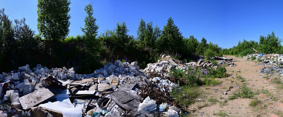 Panoramic photo of garbage and garbage outdoors under a blue sky