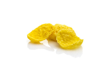 Cornflakes isolated on white. Cereal corn flakes - snack breakfast best with milk. Diet, vegetarian or clean eating concept. Macro close-up shot.