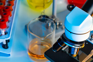 Microscope lenses on a laboratory desk close up