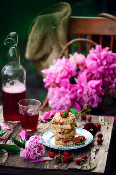 Strawberry rhubarb cheesecake bars..style vintage.outdoor photo