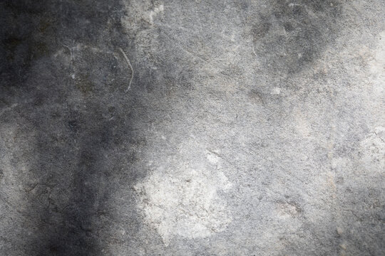 4K. Concrete real dirty wall. Seamless texture. Grunge grey background pattern. Cement and sand cracked wall of tone vintage for backdrop or decoration. Graffiti wall.