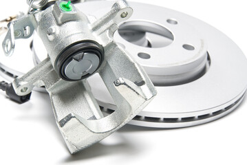 brand new brake caliper and brake discs set for car. isolated on white.