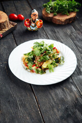 Beijing salad with beef meat cucumbers and peppers