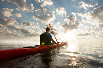 Fototapeta premium Kayaking. Man paddling a kayak. Canoeing, paddling.