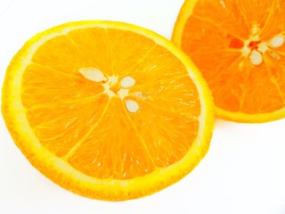 Juicy bright sweet orange on a white background close-up. Place for the buyer's text.
